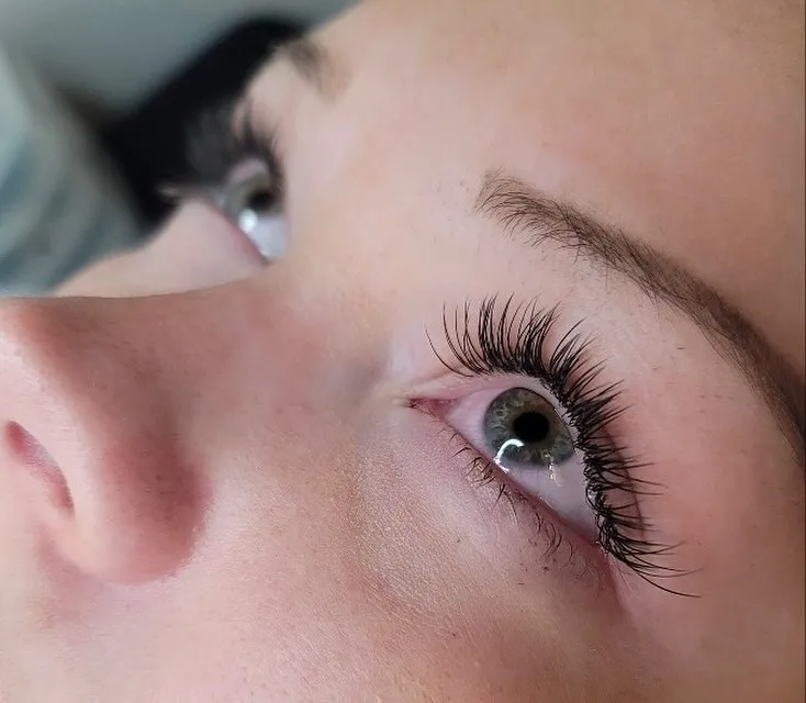 Natural style lash extensions with green eyes