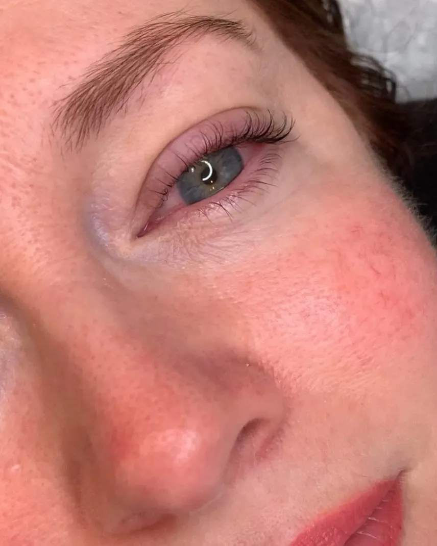 Natural lash lift close-up showing partial face