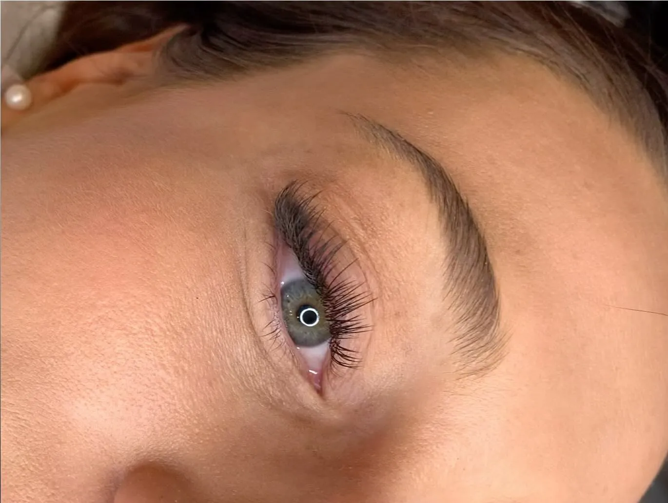 Single eye close-up showing lash extension detail